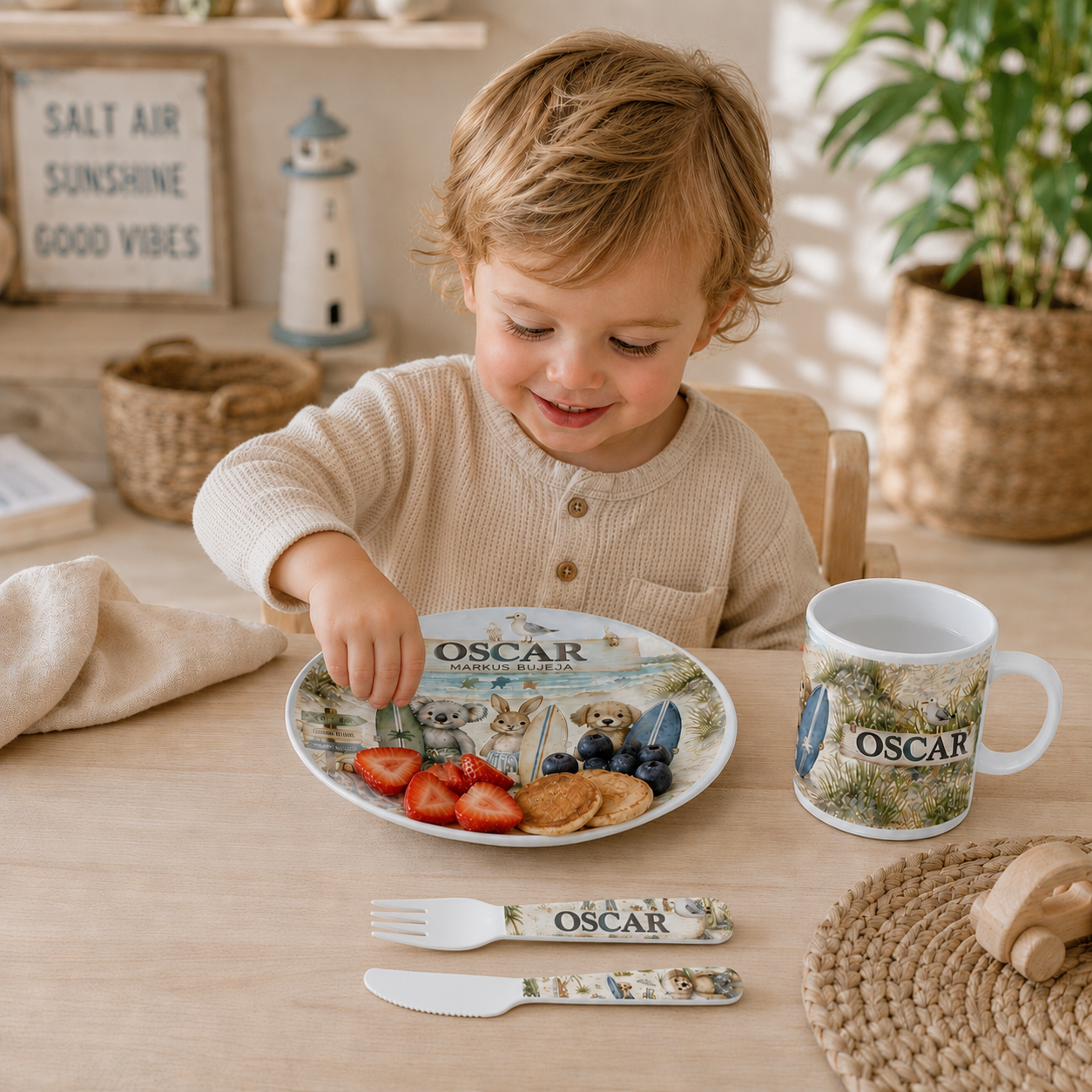 Toddler using personalised dinner set