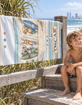 Personalised kids sand-free beach towel with name at the beach
